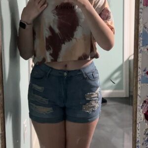 Size medium light wash Jean short